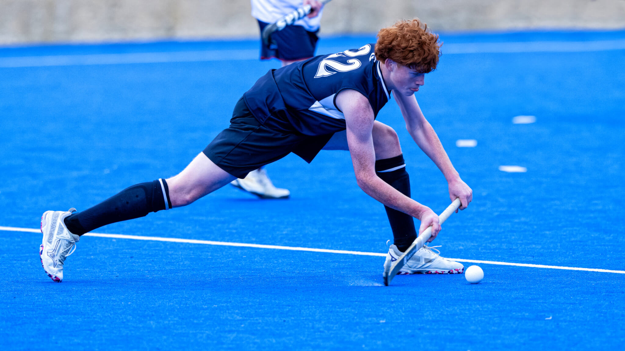 GGS boys competing in a PSA Hockey match on the artificial turf pitch, winter season